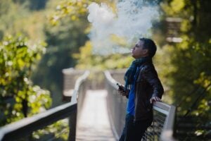 Young man vaping